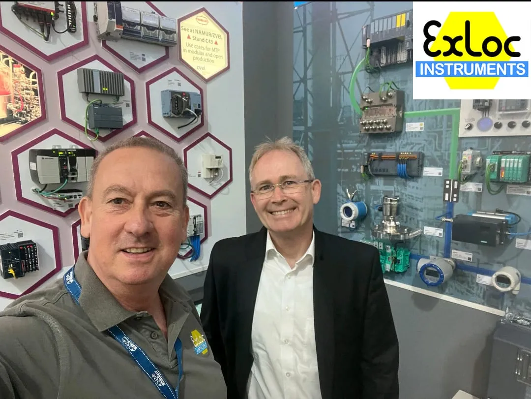 Zwei Partner am Messestand von Exloc Instruments